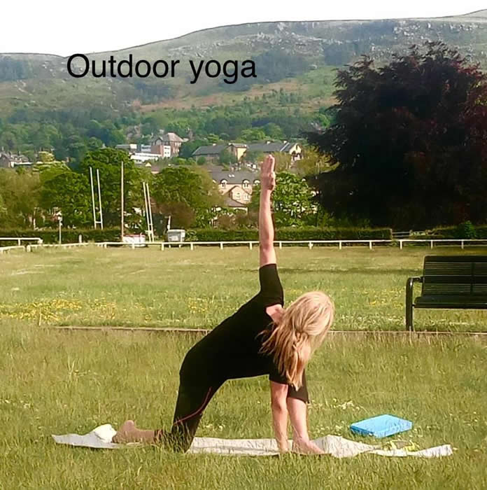 Anne-on yoga mat outdoors